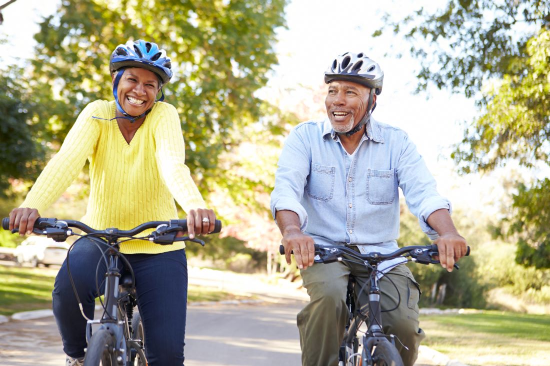 african american couple riding bikes